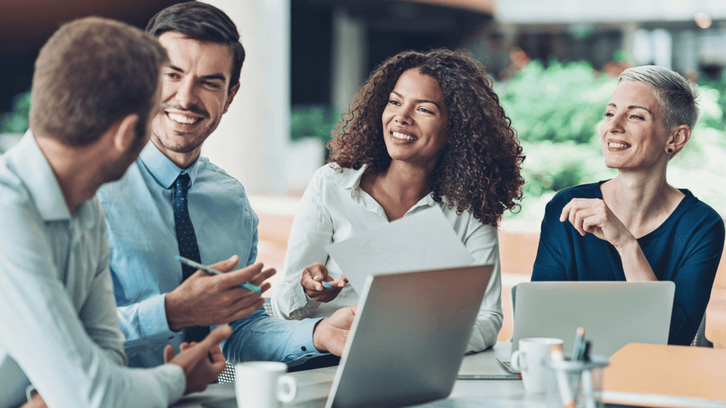 Sales reps and sales managers discussing a sales podcast