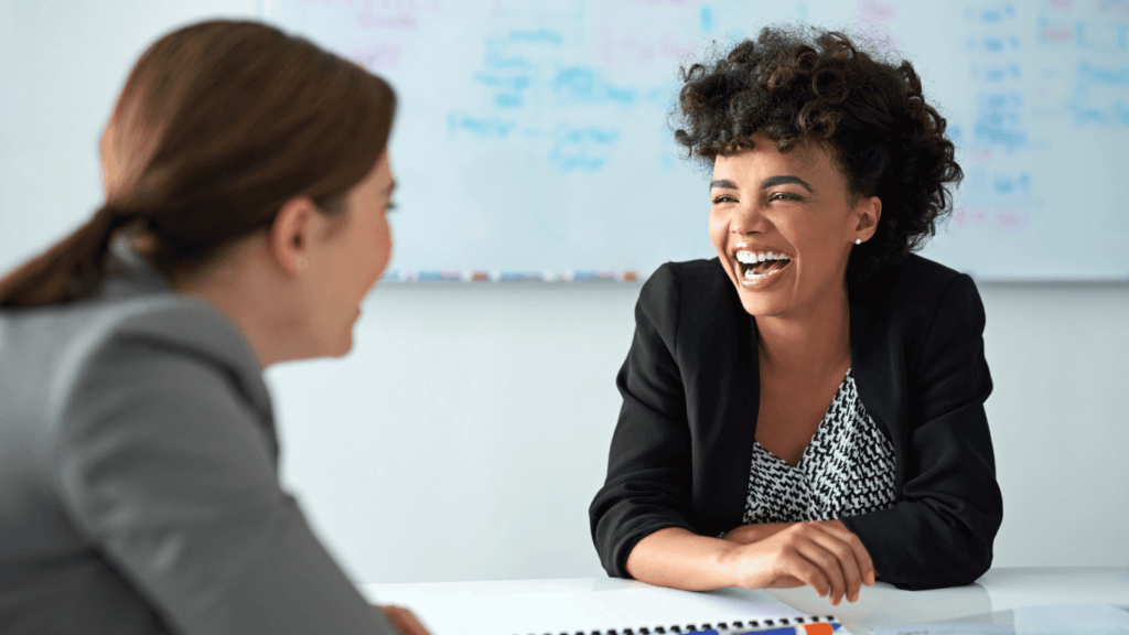 A sales professional talking to a customer and building rapport with them