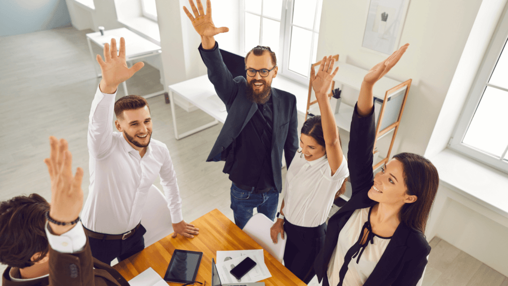 A sales oriented team celebrating achievements