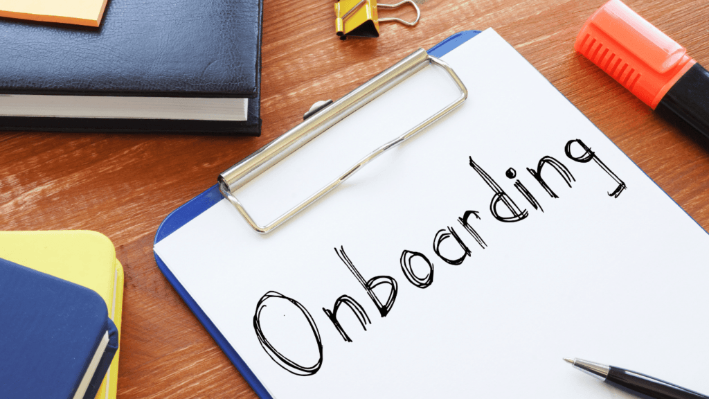 CEO or business owner going through some talking points about the VA’s role, communication channels, necessary tools, and company objectives during the thorough onboarding process