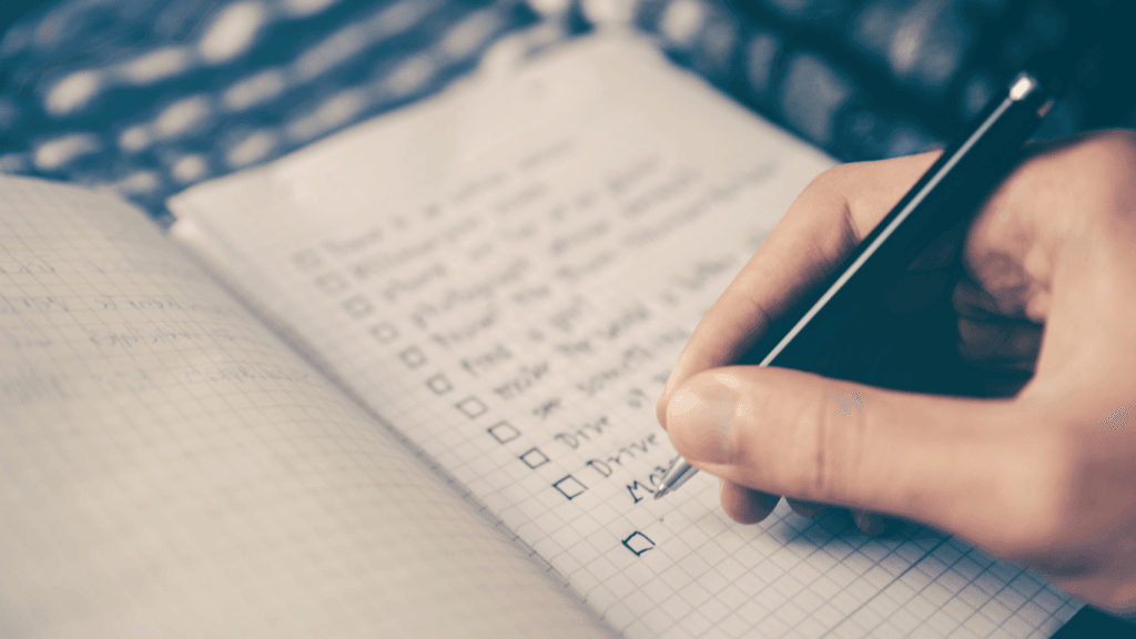 Business owner looking at a checklist for the onboarding of new remote virtual assistant